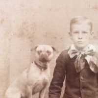 Schutte Baltimore Photographer Cabinet Card Young Boy with His Dog on Table 10.jpg