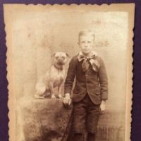 Schutte Baltimore Photographer Cabinet Card Young Boy with His Dog on Table 11.jpg