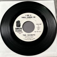  The Secrets I Feel A Thrill Coming On b:w Here I am on Omen Records Promo 1.jpg