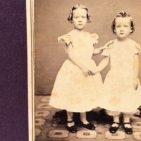 CDV of Two Sisters Dressed Alike by R. D. Ridgley Baltimore Photographer 6.jpg
